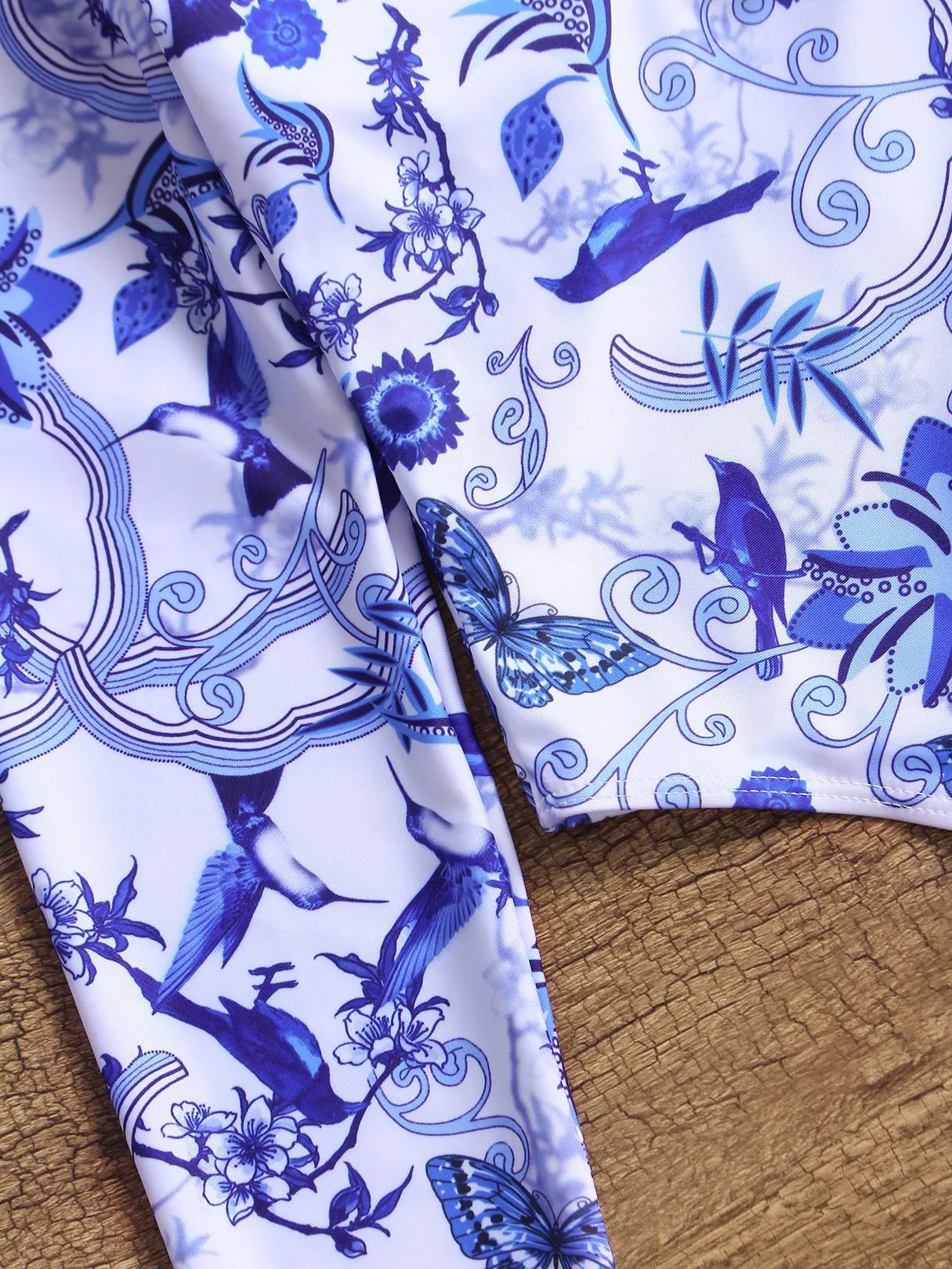 Wholesale Blue Deep V-Neck Long Sleeve Printed Backless One-Pieces Swimwears